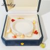 "Lxalry 18K Gold Plated Shell & Red Energy Stone Anklet â€“  Summer Beach Style Waterproof Foot Chain for Women â€“  Hypoallergenic, Fade-Resistant